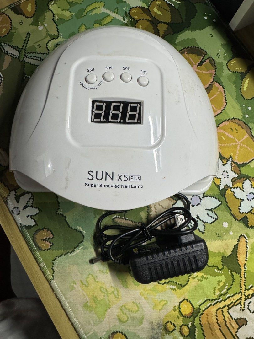 SUN X5 Plus Nail Lamp & Polish Set (Category: Hands & Nails) located in Pasig City. Submitted by pmlmri (Listing ID 1468928765, Image 1). Description: - Pre-Loved SUN X5 Plus LED/UV Nail Lamp - Pre-Loved Gel polish bundle Born Pretty, AS, Mirage Layon and Modelones - Brand New Bench Regular Polish - Nail Extensions - Nail Polish Remover (Used) - Nail Sticks (Brand New 36pcs) - Nail Rhinestones, Gems, Beads - Nail Chrome Powder Take all ₱ 1,500 Pe