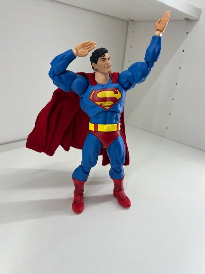 Superman Custom 1/12 Action Figure (Category: Figurines & Statues) located in San Juan. Submitted by docpratty (Listing ID 1468779290, Image 2). Description: This is a custom Superman action figure made from Mezco and MAFEX parts. The head and hands are from the Mezco “Man of Steel” figure, while the body is from the MAFEX The Dark Knight Returns Superman figure. All accessories from the MAFEX figure are included. The head is attached using a cus