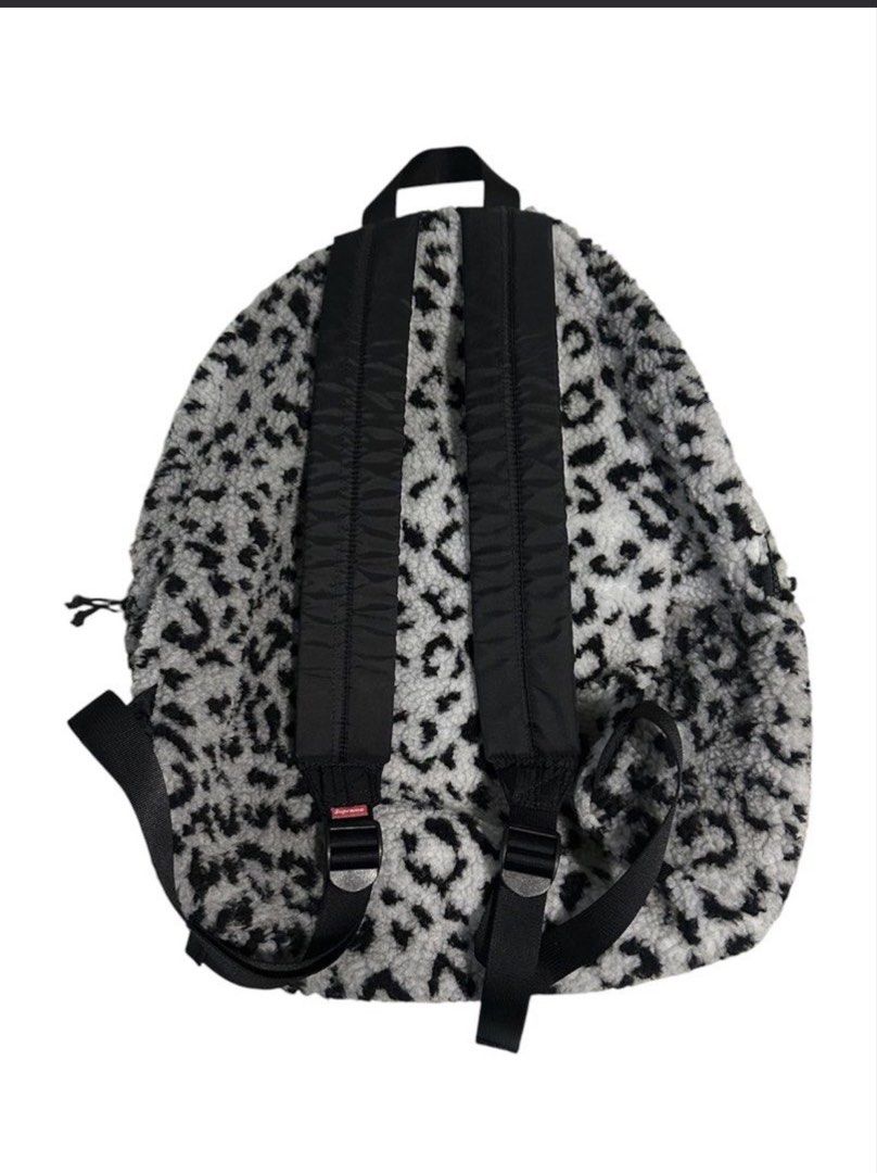 Supreme Faux Fur Backpack White Black Leopard (Category: Backpacks) located in Manila. Submitted by lodburger (Listing ID 1468719067, Image 2). Description: - White and black faux fur backpack with bold leopard print - Features iconic Supreme box logo patch on the front pocket - Soft sherpa fleece texture throughout with a clean interior and exterior - Dual zip main compartment and front pocket for easy storage - Adjustable black shoulder straps 