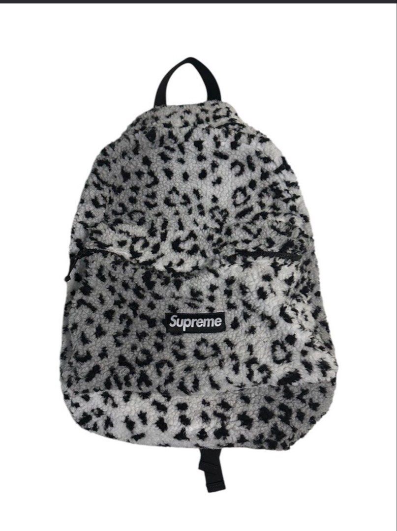 Supreme Faux Fur Backpack White Black Leopard (Category: Backpacks) located in Manila. Submitted by lodburger (Listing ID 1468719067, Image 1). Description: - White and black faux fur backpack with bold leopard print - Features iconic Supreme box logo patch on the front pocket - Soft sherpa fleece texture throughout with a clean interior and exterior - Dual zip main compartment and front pocket for easy storage - Adjustable black shoulder straps 