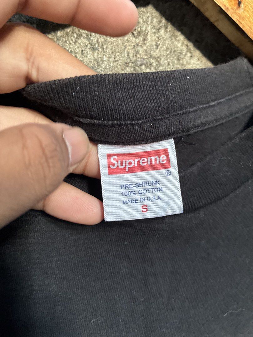 Supreme Photo Tee Black Size S (Category: Tshirts & Polo Shirts ) located in Manila. Submitted by assortedgoodsv3 (Listing ID 1468712969, Image 3). Description: - Brand: Supreme - Item: Photo Tee - Color: Black - Size: Small (S) - Material: 100% Cotton, Made in U.S.A. (Pre-shrunk) - Design: Classic graphic print on front with two guys in box logos; small paisley print near bottom back hem - Details: Standard crew neck, clean tags attached inside 