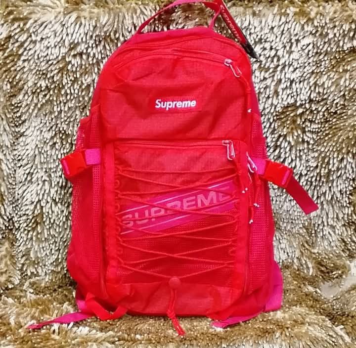 Supreme Red Backpack with Bungee Cords Ke (Category: Backpacks) located in Manila. Submitted by lecha201992 (Listing ID 1468883909, Image 1). Description: .