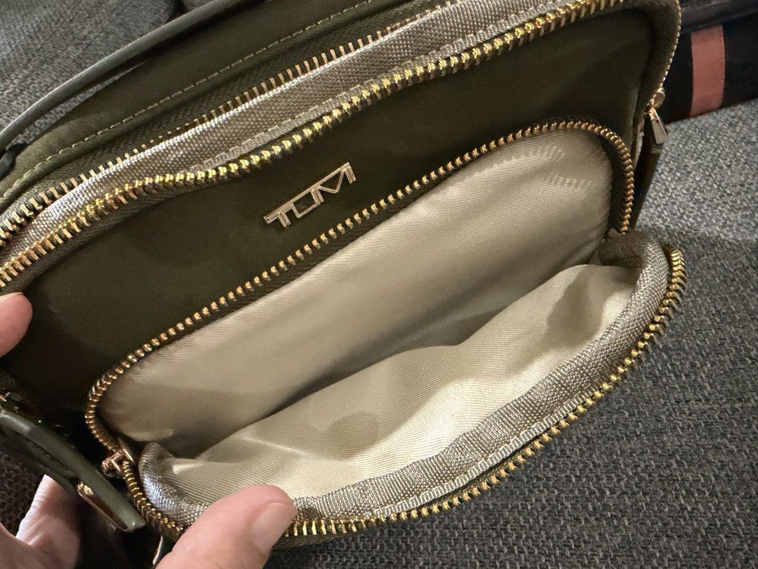T U M I CROSSBODY (Category: Luxury Bags & Wallets) located in Quezon City. Submitted by glamshoppers101 (Listing ID 1468732690, Image 2). Description: LAST PRICE POSTED- Selling low already WALLET - FREE ONLY! Like new Used once only Original No inclusion Regular price- Body Bag- $350.