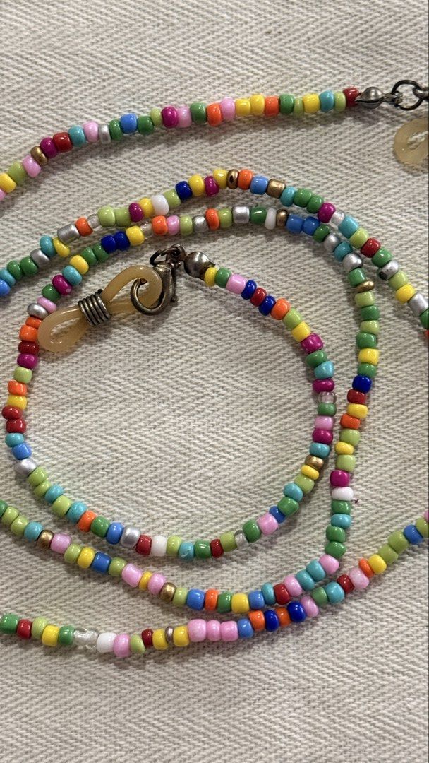 TAKE ALL 3 - Beaded Eyeglasses/Sunglasses Chain (Category: Sunglasses & Eyewear) located in Manila. Submitted by oliviablanche (Listing ID 1468752981, Image 3). Description: TAKE ALL 3 - Perfect for carrying your sunglasses or reading glasses - Cute additional accessory to your outfit - Length [approx]: 1 - 28.5 inches 2 - 26 inches 3 - 20 inches - Vibe: Effortless beach day, coffee run, or festival look - Wear it as a glasses chain or let it dou