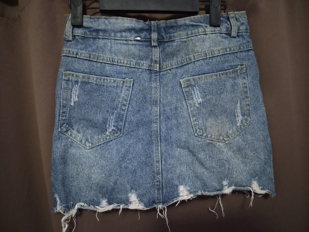 Tattered Denim Skirt (Category: Skirts) located in Malolos. Submitted by aemcloset (Listing ID 1468887846, Image 2). Description: size 26 length 14 hard denim.