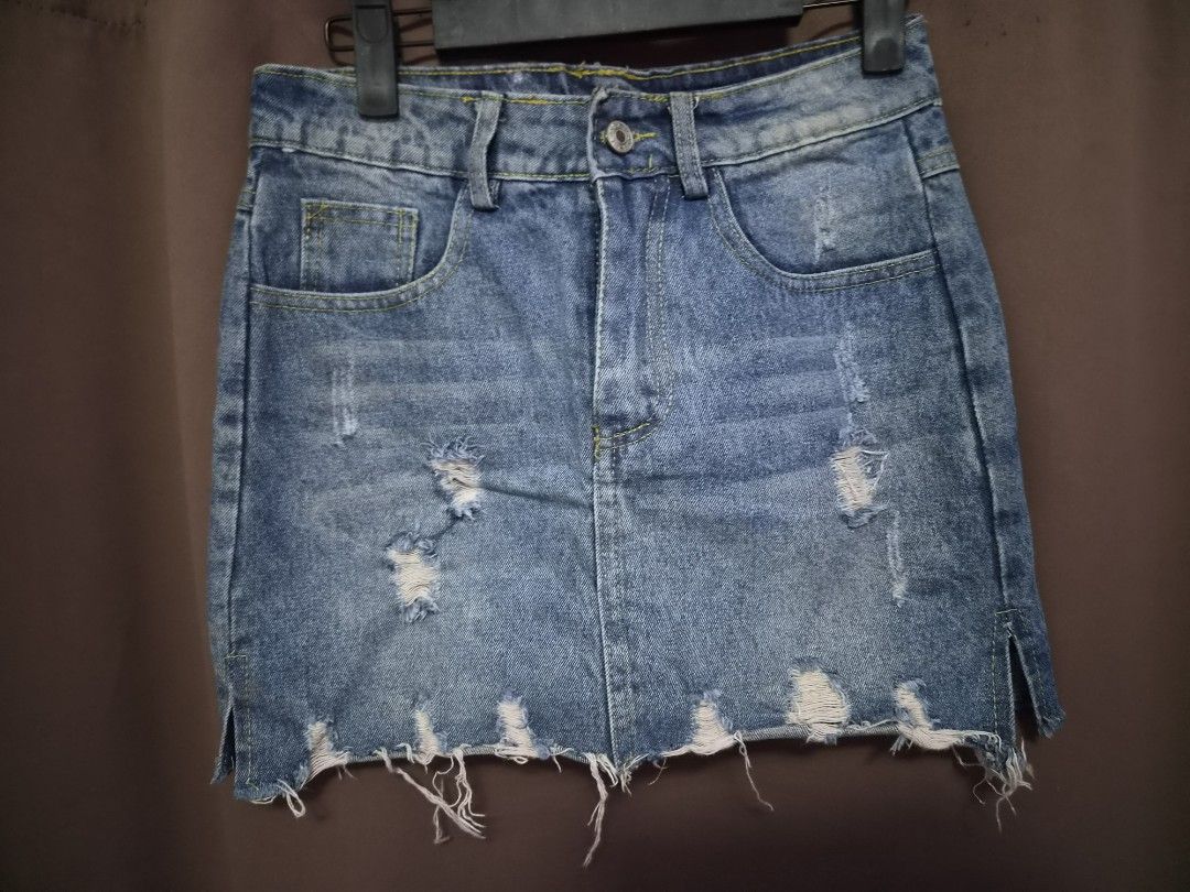 Tattered Denim Skirt (Category: Skirts) located in Malolos. Submitted by aemcloset (Listing ID 1468887846, Image 1). Description: size 26 length 14 hard denim.