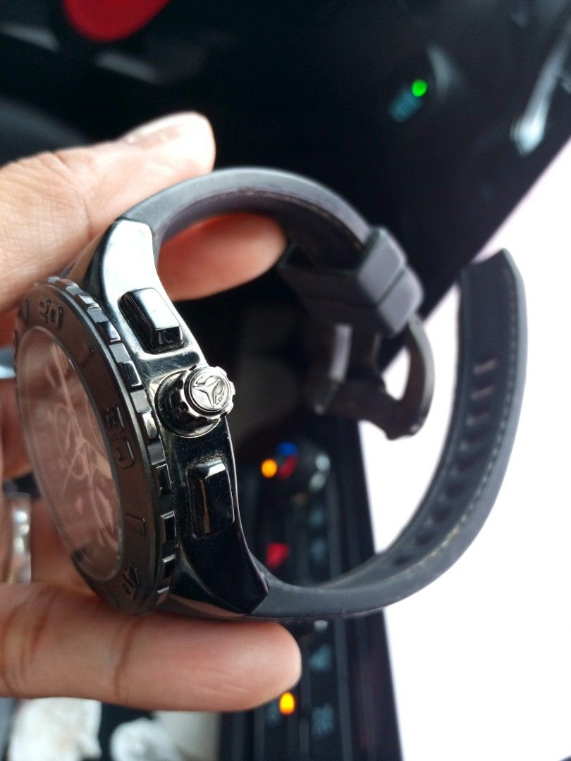 TechnoMarine Chronograph Watch Black Silicone Strap (Category: Men's Watches) located in Malolos. Submitted by lizarondoe59660 (Listing ID 1468741899, Image 2). Description: - Brand: TechnoMarine - Type: Chronograph watch - Dial: Black textured dial with 3 sub-dials and date window at 4 o'clock - Bezel: Black rotating bezel with numeric markers - Case: Stainless steel - Strap: Branded black silicone strap with contrast stitching and distinct logo