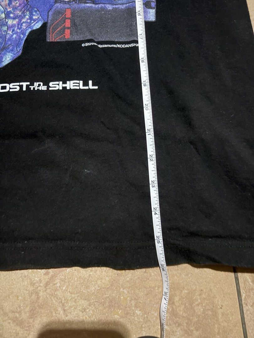 The Ghost in the Shell Anime T-Shirt (Category: Tshirts & Polo Shirts ) located in Las Pinas. Submitted by nateb. (Listing ID 1468849877, Image 2). Description: - Design: Iconic Ghost in the Shell anime graphic with Motoko Kusanagi on the front - Material: 100% premium cotton - Size: Medium (Pit-to-pit: ~18.5 inches, Length: ~26 inches) - Details: Purchased at the Masamune Shirow Exhibit last year - Condition: Clean fabric with minor, normal wear