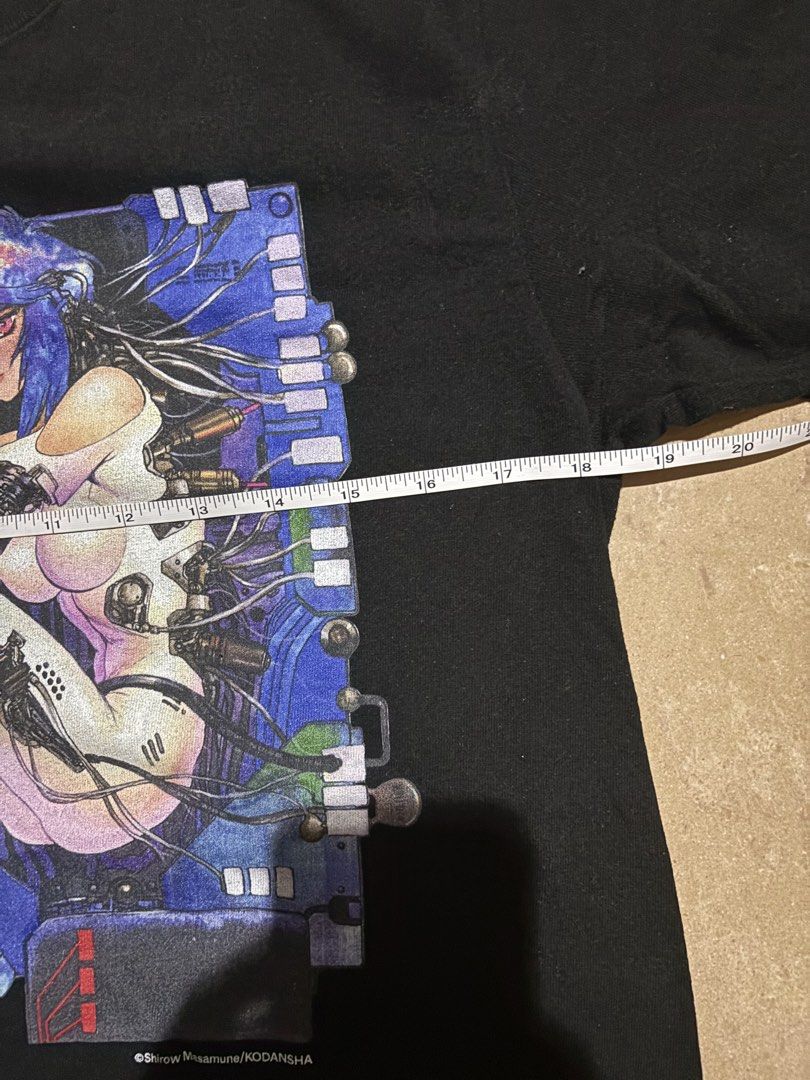 The Ghost in the Shell Anime T-Shirt (Category: Tshirts & Polo Shirts ) located in Las Pinas. Submitted by nateb. (Listing ID 1468849877, Image 3). Description: - Design: Iconic Ghost in the Shell anime graphic with Motoko Kusanagi on the front - Material: 100% premium cotton - Size: Medium (Pit-to-pit: ~18.5 inches, Length: ~26 inches) - Details: Purchased at the Masamune Shirow Exhibit last year - Condition: Clean fabric with minor, normal wear