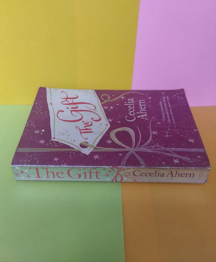 The Gift by Cecelia Ahern Novel Paperback (Category: Storybooks) located in Quezon City. Submitted by gaiarisaheart (Listing ID 1468727332, Image 3). Description: - Title: Christmas novel by bestselling author Cecelia Ahern - Publisher: Harper - Format: Standard paperback with paper cover - Design: Beautiful purple theme with snowflake graphics - Plot: A heartwarming story about time, love, and friendship featuring Lou Suffern and Gabe -355 pages
