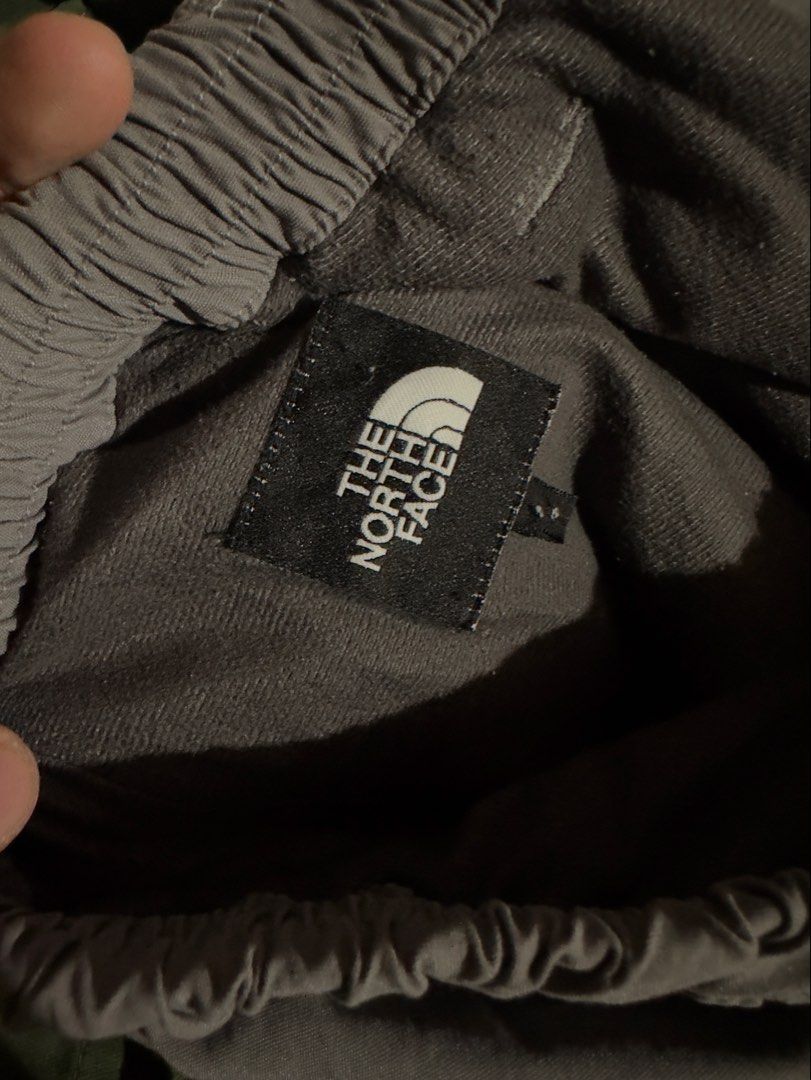 The North Face Hiking Pants (Category: Activewear) located in Manila. Submitted by youngvill (Listing ID 1468795903, Image 2). Description: - Color: gray - Closure: Button waist - Pockets: Secure zippered side pockets - Condition: Clean, no major flaws - Ideal for: Outdoor trails or Streetwear outfits.