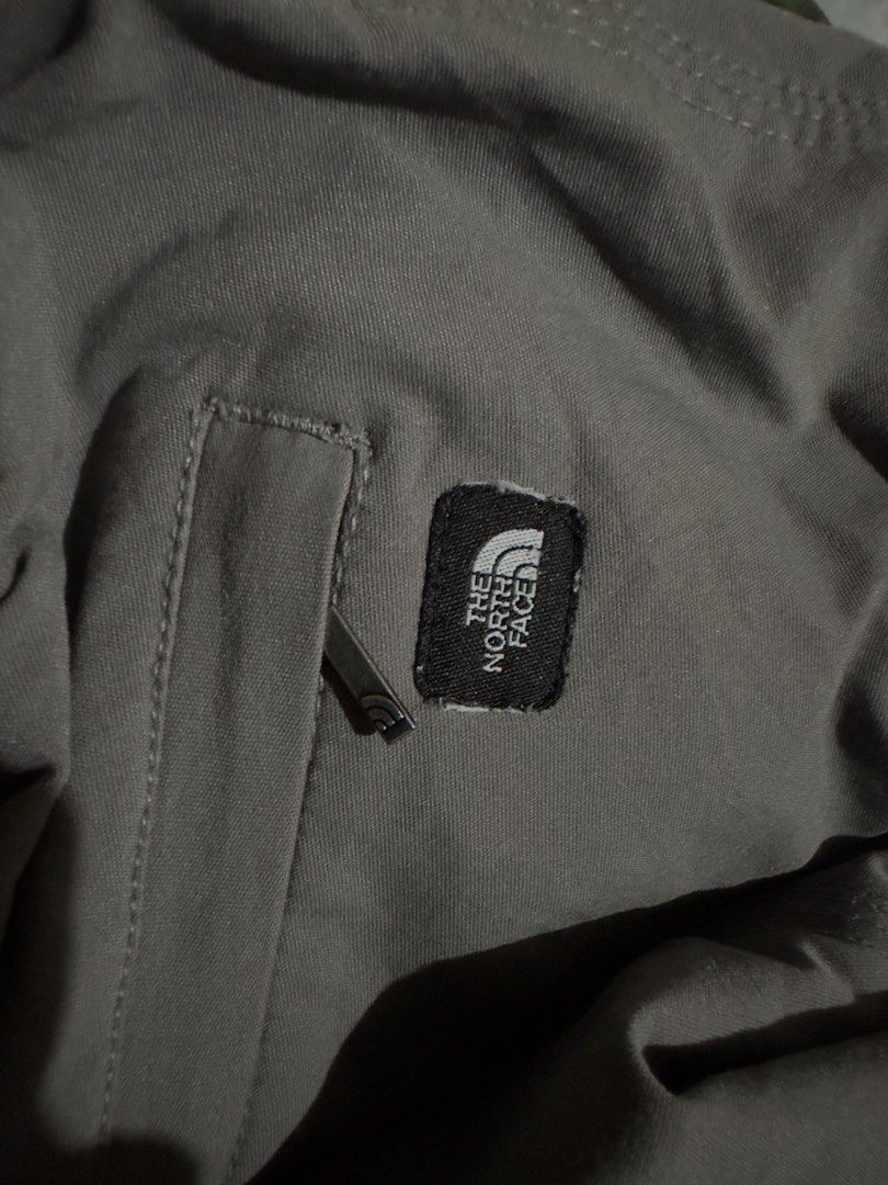The North Face Hiking Pants (Category: Activewear) located in Manila. Submitted by youngvill (Listing ID 1468795903, Image 3). Description: - Color: gray - Closure: Button waist - Pockets: Secure zippered side pockets - Condition: Clean, no major flaws - Ideal for: Outdoor trails or Streetwear outfits.