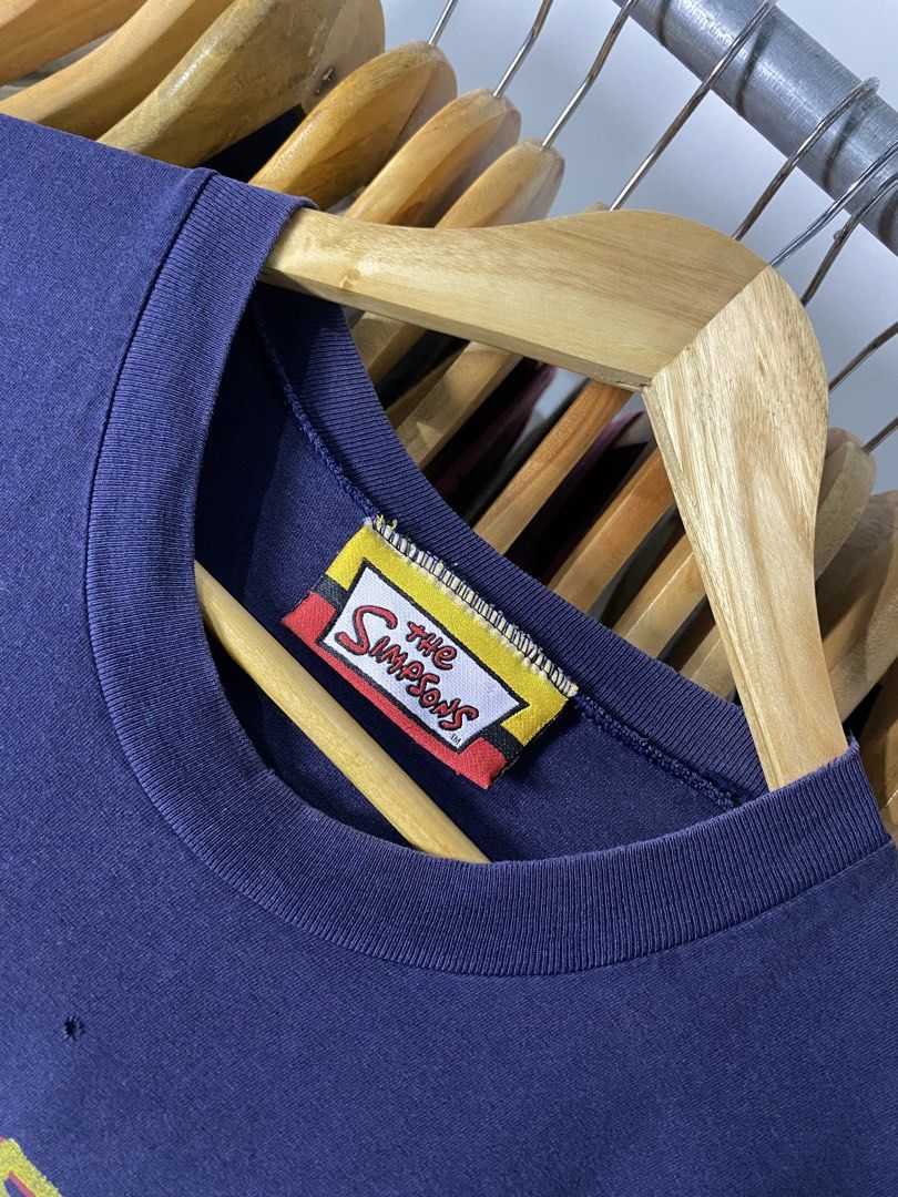 the Simpsons Shirt 2007 (Category: Formal Shirts) located in Trece Martires City. Submitted by ridgeridethrift (Listing ID 1468770286, Image 3). Description: width - 21 Length - 30 Multiple pin hole pen hole, have fade.