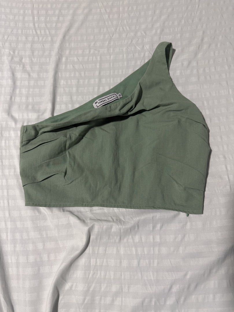 The Tinsel Rack sage green one shoulder top (Category: Sleeveless) located in Caloocan City. Submitted by ncldumps (Listing ID 1468881632, Image 1). Description: - Bought it from Singapore - Linen fabric can do meetups around ubelt! .