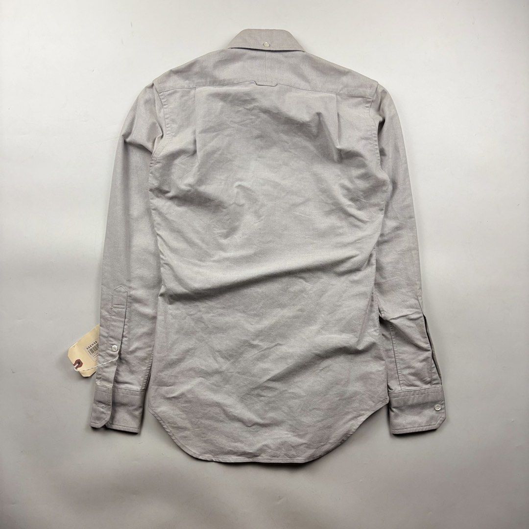 Thom Browne Tiger Embroidered Shirt (Category: Tshirts & Polo Shirts ) located in Makati City. Submitted by ragrepository (Listing ID 1468731248, Image 3). Description: Thom Browne Tiger Embroidered Shirt Tagged as 00 Length- 28” Pit to pit- 18” Sleeves- 24.5” Shoulder-15.5” Condition-NWT Flaw-Storage dust .