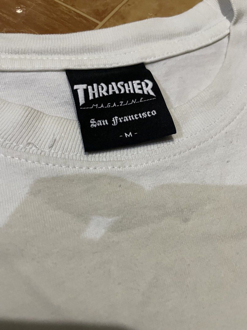 Thrasher white tee blue and red flame (Category: Tshirts & Polo Shirts ) located in Manila. Submitted by trueriver.3b37bc (Listing ID 1468875519, Image 3). Description: -dimes: 29x22 large to xl size - issue: repaired hole/ minimal flaws need wash -condition: excellent Asking: 200+sf.