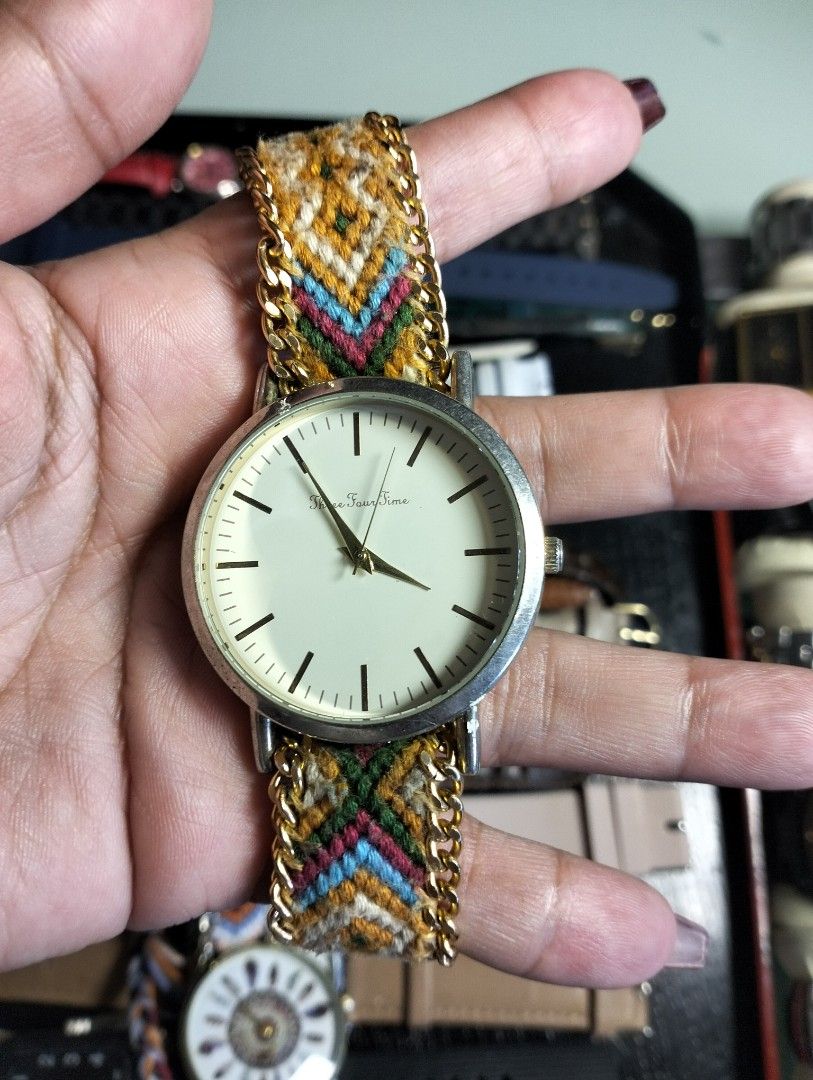 Three Four Time and Bohemian Quartz Watches Bundle (Category: Women's Watches) located in General Mariano Alvarez. Submitted by ma.miafajardo1219 (Listing ID 1468925224, Image 2). Description: - Set of 2 unique boho-style wristwatches - Features colorful woven fabric straps and stylish chain details - Watch 1: Clean white dial with 'Three Four Time' branding and minimalist stick markers - Watch 2: Detailed feather mandala design with reliable qua