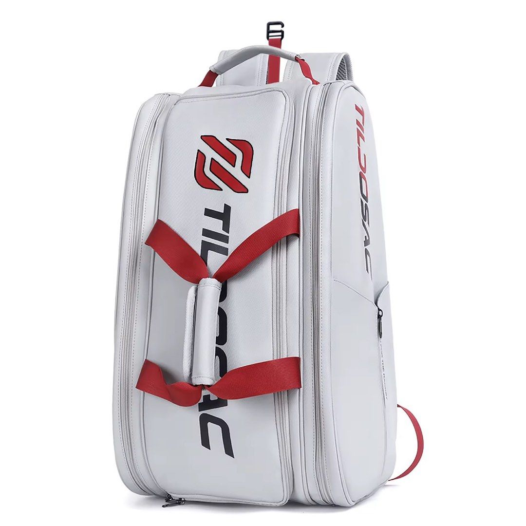 TILDOSAC Pickleball Backpack White Red (Pre-Order: 2 weeks ETA) (Category: Racket and Ball Sports) located in Taguig. Submitted by bumbayandsell (Listing ID 1468744615, Image 1). Description: - Color: White and red with bold TILDOSAC branding - Storage: Multiple compartments with heavy-duty zippers - Carry: Red grab handles and adjustable shoulder straps - Design: Clean, structured shape that holds its form well - Usage: Perfect gear haul for cou