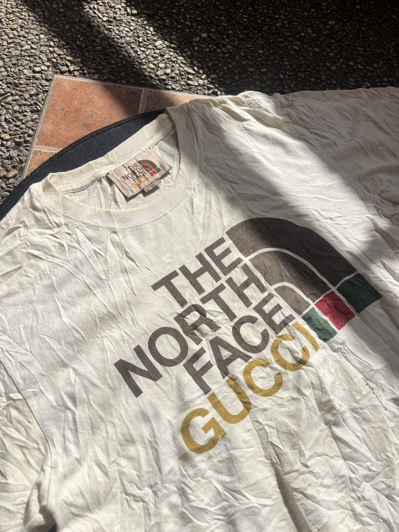 TNF x Gucci (Category: Tshirts & Polo Shirts ) located in Davao. Submitted by vnxcentt (Listing ID 1468714228, Image 2). Description: TNF x Gucci 22 x 29 - Stain .