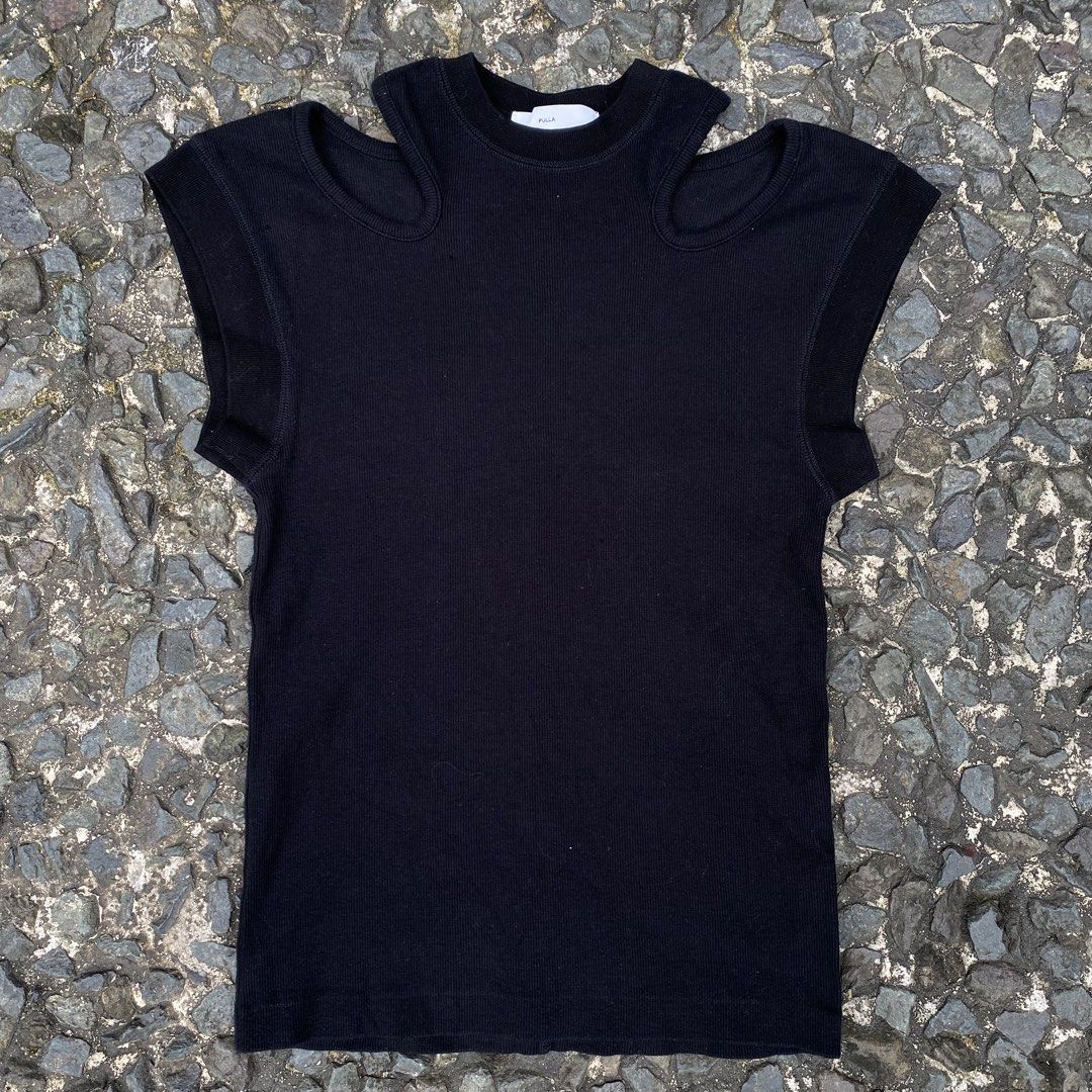 Toga Pulla Archives Rib Sleeveless Top (Category: Sleeveless) located in Quezon City. Submitted by rebirthalley (Listing ID 1468775477, Image 2). Description: Width-15 Length-24 Sleeve- Shoulder-12 Hem-14.5 Excellent Condition No flaws .