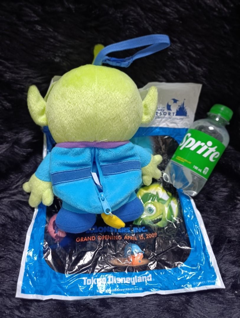 Tokyo Disney Resort Alien Plush Toy (Category: Plushies & Soft Toys) located in Iloilo. Submitted by jpk_ok_sales (Listing ID 1468804676, Image 3). Description: - Authentic Tokyo Disney Resort merchandise - Toy Story Green Alien in iconic blue spacesuit - Features a handy back zipper pouch with yellow zipper pull and a strap - Includes original Tokyo Disney Disneyland packaging bag - Brand new with tag attached - Perfect for daily use or collecti