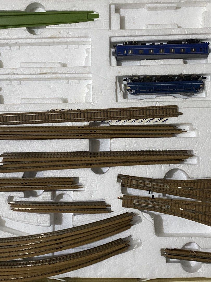 Tomix Basic Set EX II 90112 Model Train Collection (Category: Vehicle & Diecast Models) located in Davao. Submitted by hoowans_surplus (Listing ID 1468868106, Image 3). Description: - Complete Tomix Basic Set EX II model train starter kit - Includes original box, tracks, and controller - Comes with classic blue train cars and figures - Includes multiple Railway Collection Series 8 boxes and parts - Stored carefully in original packaging with all 