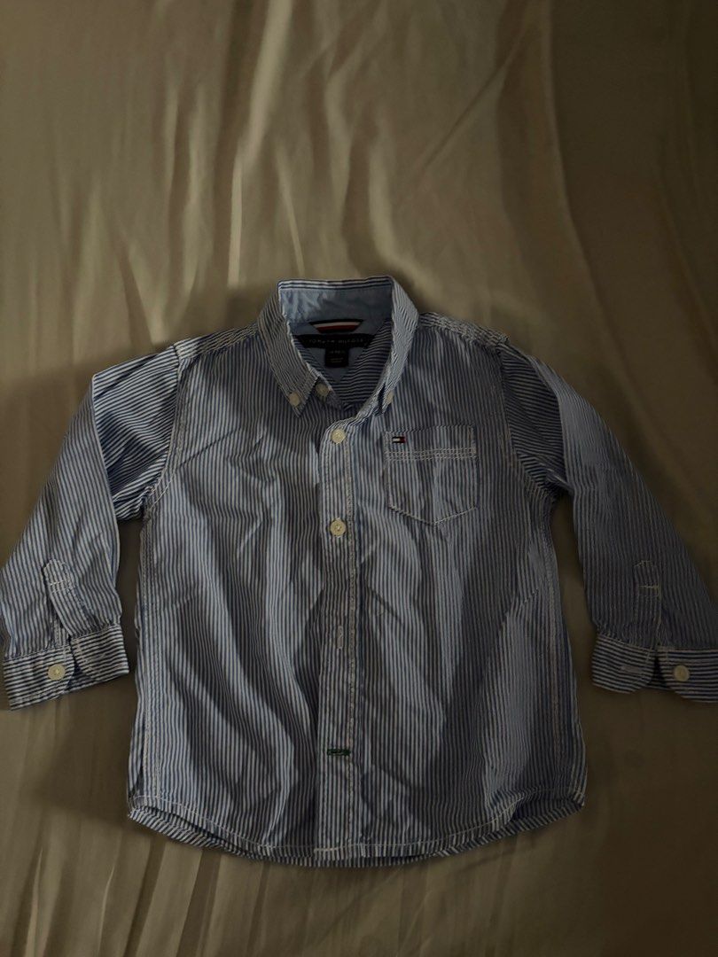 Tommy Hilfiger Button down formal polo shirt top 2t (Category: Babies & Kids Fashion) located in Manila. Submitted by chandleria (Listing ID 1468929441, Image 1). Description: super pogi this polo shirt tag size: 2t brand: Tommy Hilfiger.