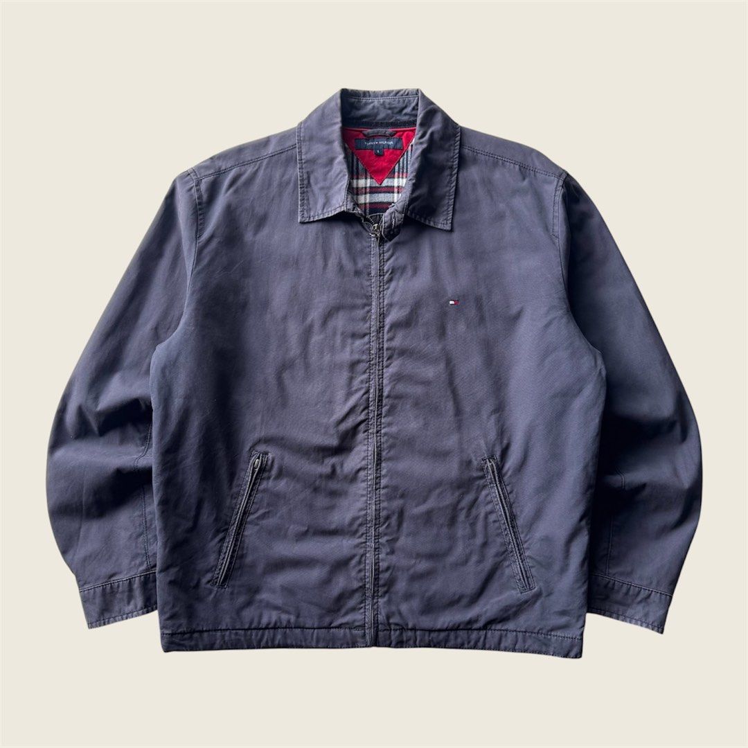 Tommy Hilfiger Flannel Lined Navy Harrington Jacket (Category: Coats, Jackets and Outerwear) located in Baguio. Submitted by retrophiletown (Listing ID 1468898395, Image 1). Description: Tommy Hilfiger Flannel Lined Navy Harrington Jacket Measurement in inches Width: 25 Length: 27 Issues: minor fade, scratch.