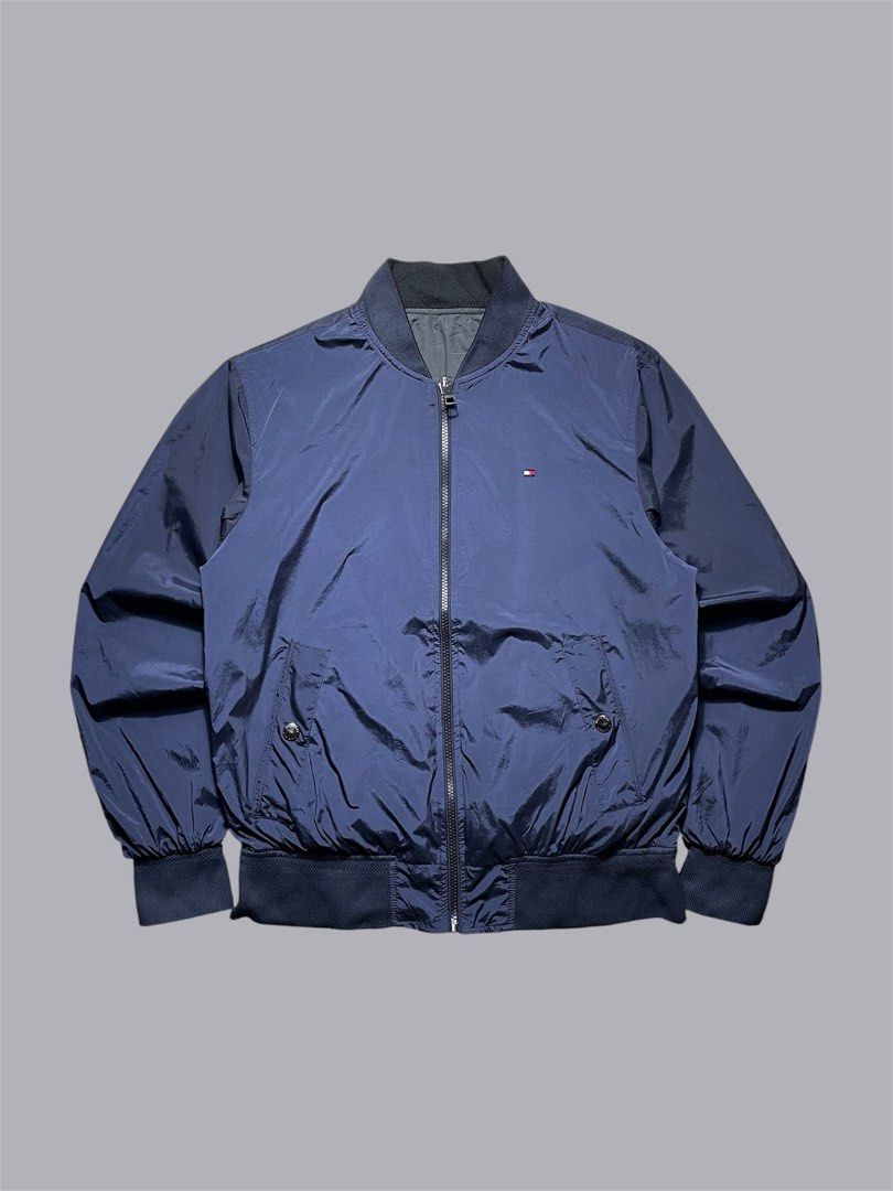 Tommy Hilfiger Reversible bomber jacket (Category: Coats, Jackets and Outerwear) located in Quezon City. Submitted by renovare.196 (Listing ID 1468903077, Image 2). Description: Tommy Hilfiger Reversible bomber jacket As New Condition Color Rate: 9.8/10 Issue Not Working Last pic Measurements • Width: 22 • Length: 25.5 Price: 2000 obo DM IF INTERESTED📥.