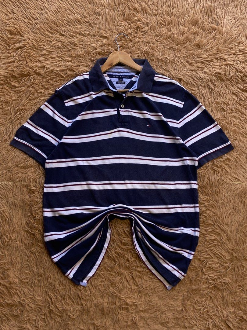 Tommy hilfiger stripe polo (Category: Formal Shirts) located in Mangaldan. Submitted by raversantos (Listing ID 1468914342, Image 1). Description: W-22 L-30 No issue Color rate 9.5/10 Excellent condition.