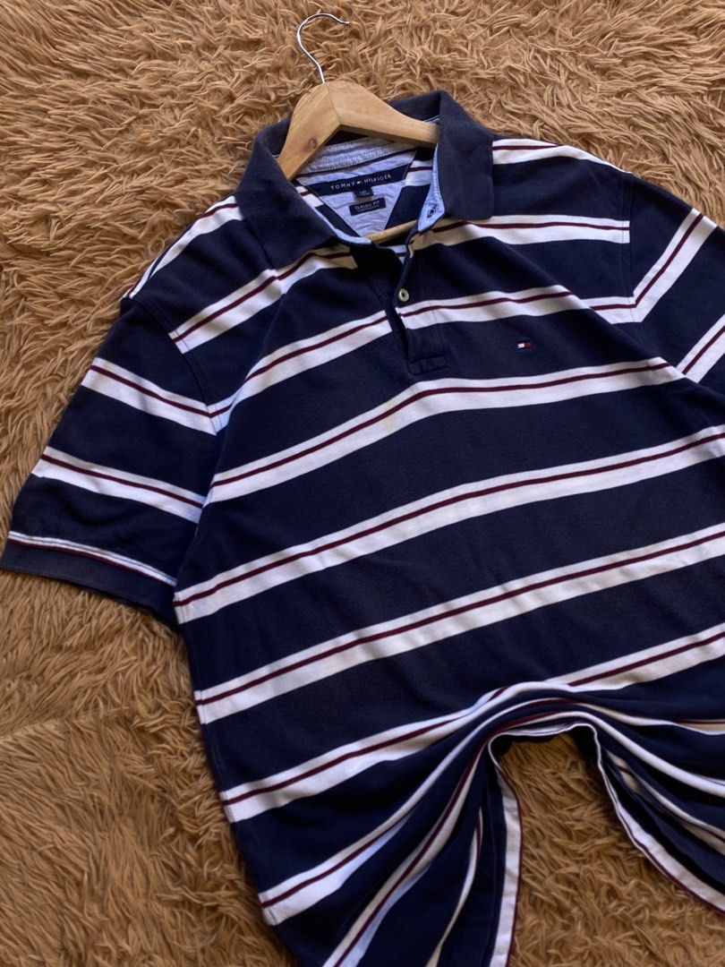 Tommy hilfiger stripe polo (Category: Formal Shirts) located in Mangaldan. Submitted by raversantos (Listing ID 1468914342, Image 3). Description: W-22 L-30 No issue Color rate 9.5/10 Excellent condition.