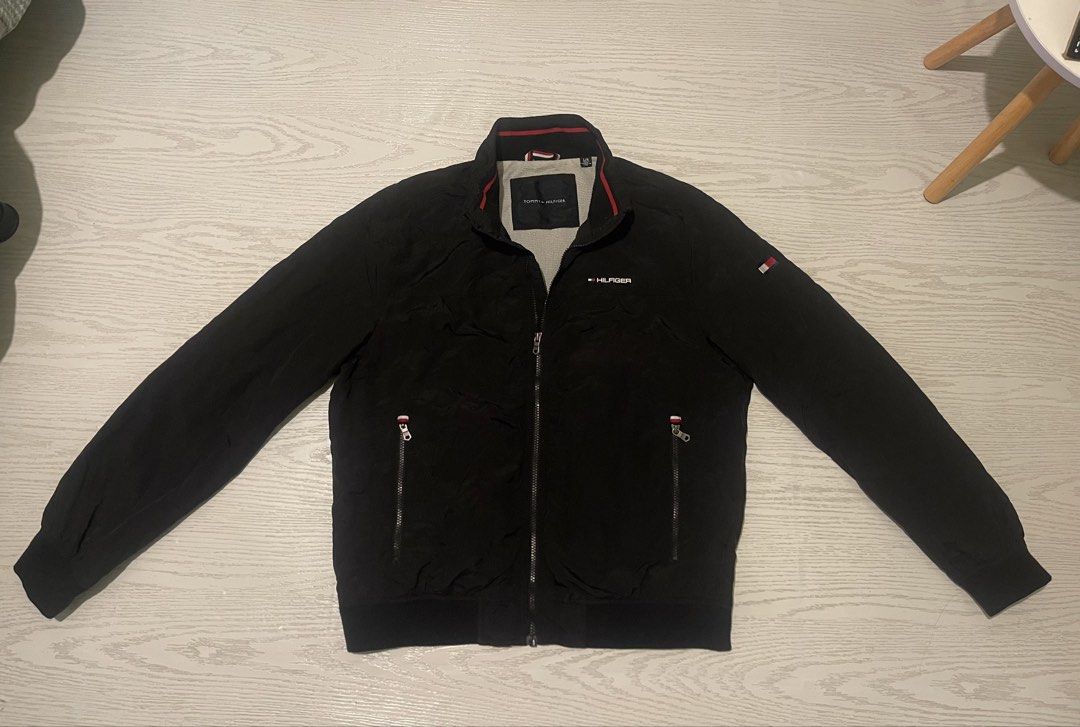 Tommy Hilfiger Windbreaker Jacket (Category: Coats, Jackets and Outerwear) located in Manila. Submitted by karlthrift922 (Listing ID 1468846543, Image 2). Description: Large up to XL size As new condition No issue.