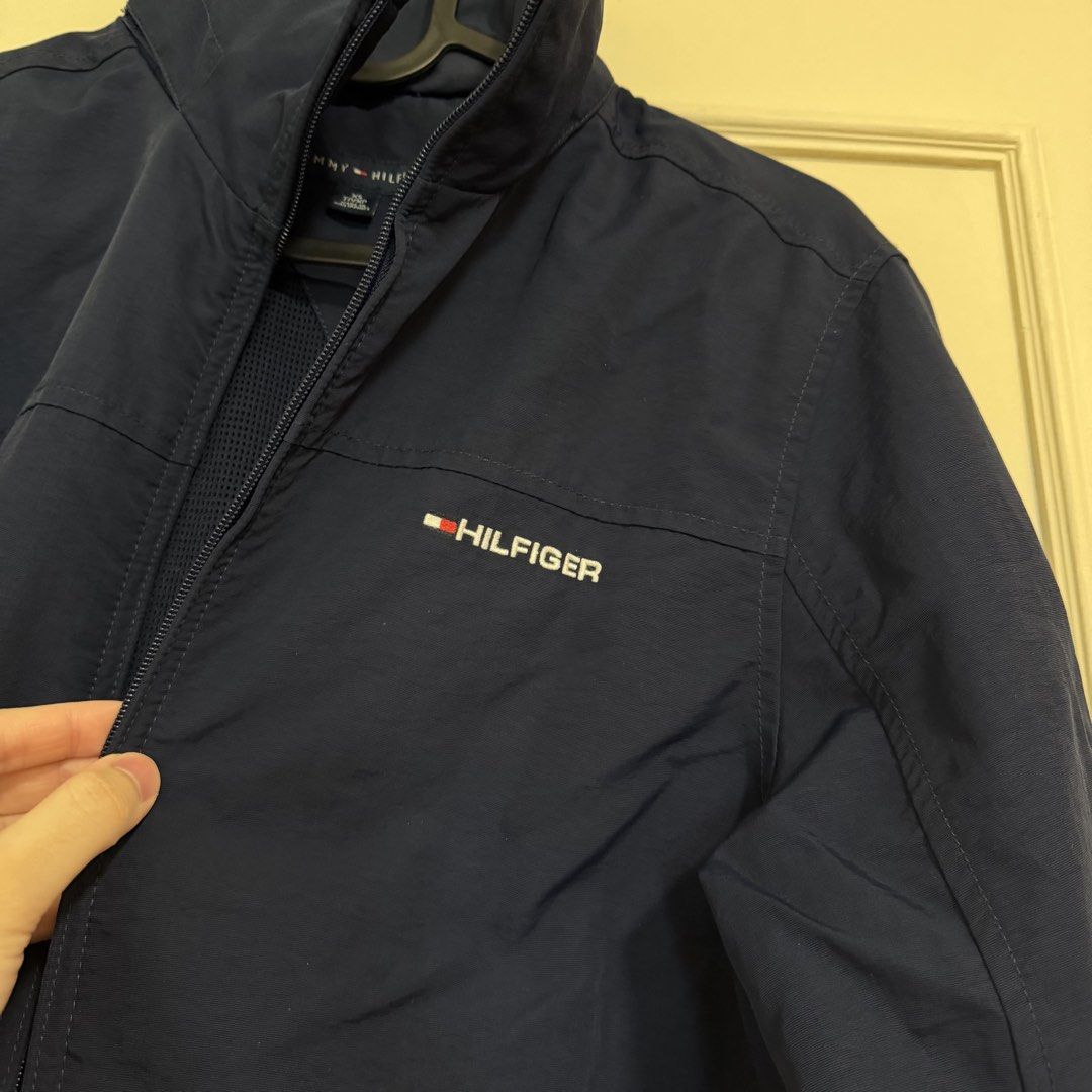Tommy Hilfiger Yacht Jacket (Category: Coats, Jackets and Outerwear) located in Manila. Submitted by usetheoxfordcomma (Listing ID 1468825141, Image 2). Description: Windbreaker Size XS but fits small Some lint buildup on the interior side of the elastic waist band (probably removable) Has a packable hood No other issues Shipping only via same-day delivery services.