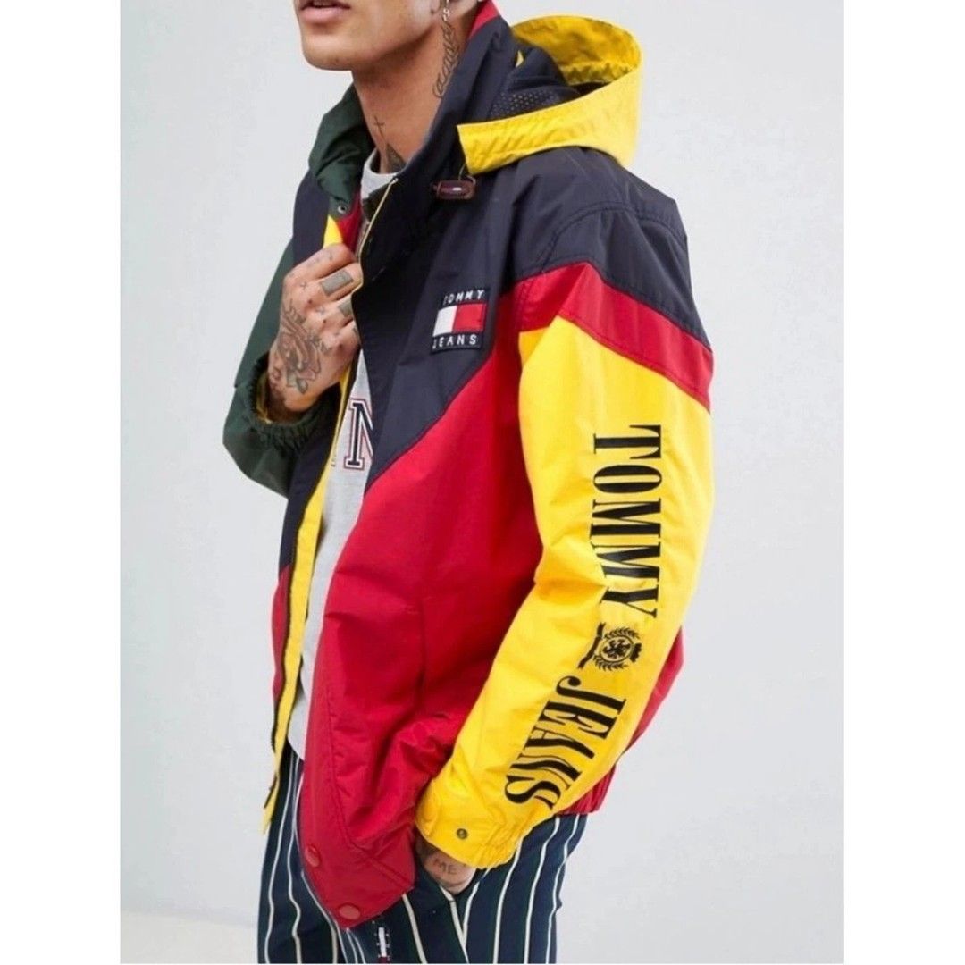 Tommy jeans windbreaker jacket (Category: Coats, Jackets and Outerwear) located in Taytay. Submitted by GRIND720_II (Listing ID 1468841908, Image 1). Description: Tommy jeans 90's capsule color block sailing jacket medium on tag LARGE FIT 23.5 x 27.5 Excellent 2999.