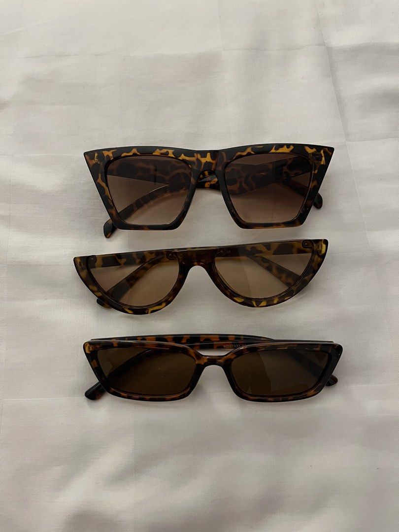 Tortoise Shell Sunglasses Set of Three (Category: Sunglasses & Eyewear) located in Cavite. Submitted by bihnibini (Listing ID 1468820634, Image 1). Description: - Set of 3 trendy tortoise shell sunglasses - Top: Oversized square frames with gradient brown lenses - Middle: Unique half-moon flat top design - Bottom: Classic slim rectangular frames - Rich brown tortoiseshell pattern throughout - Great budget-friendly bundle to switch up your daily f