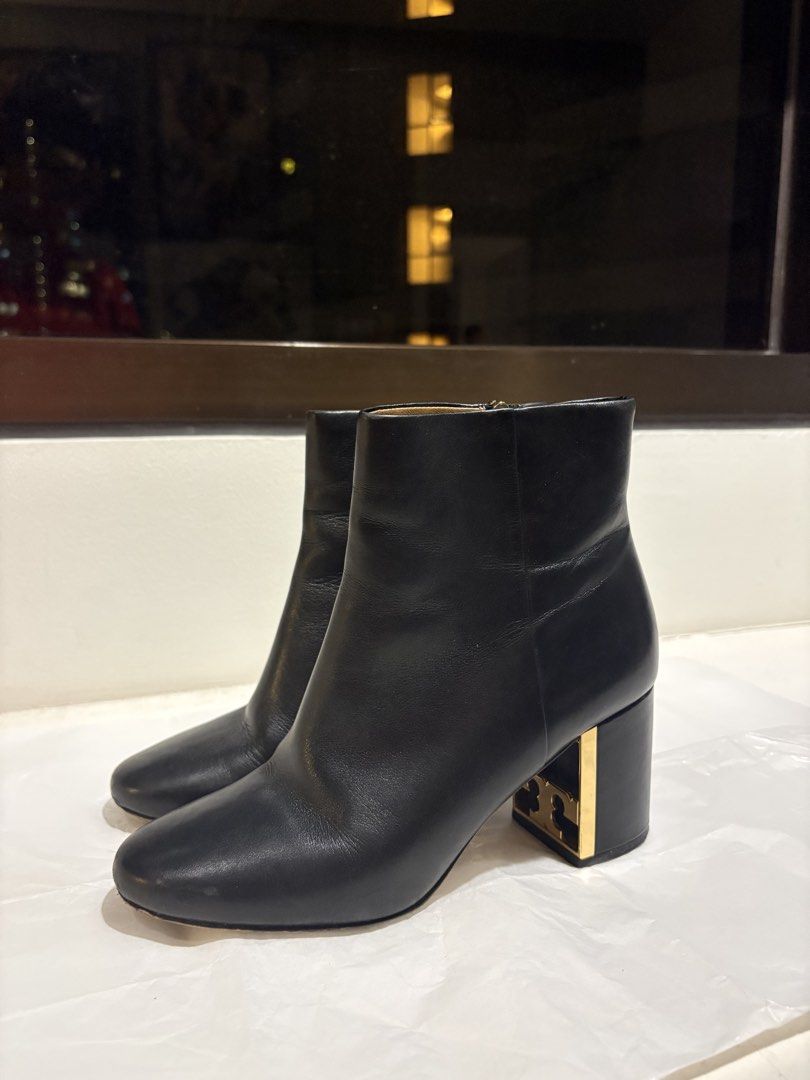 Tory Burch boots 6.5M (Category: Boots) located in Taguig. Submitted by loise001_of_rewear (Listing ID 1468814668, Image 1). Description: Tory Burch low, block-heeled boots. Subtle gold Tory Burch logo detailing on the inner heel. About 2.5in block heel height. Inner side zips. 6.5M, fits EU 37 No returns or exchanges. Please feel free to ask for more details on the item. .