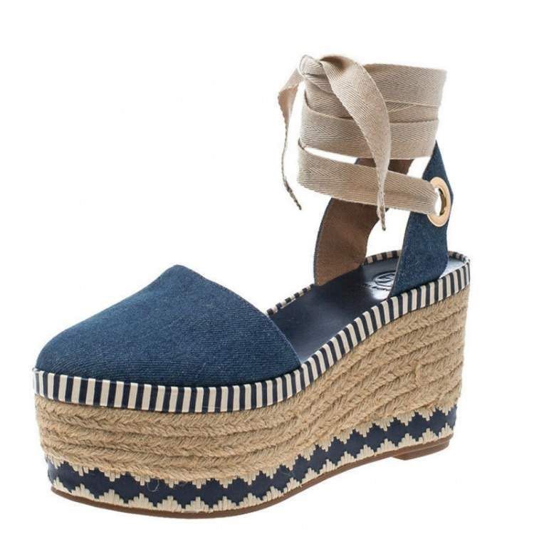 Tory Burch Denim Espadrille Wedge Sandals (Category: Wedges) located in Quezon City. Submitted by sempai_shoemaker (Listing ID 1468828916, Image 1). Description: FOR SALE LEGIT TORY BURCH DANDY DENIM ESPADRILLE WEDGE SIZE 6.5 womens Mint condition Orig price 350 USD SELLING IT FOR ONLY 8000php Pm for more info Meet up Tomas morato quezon city - Brand: Tory Burch - Style: Denim wedge sandals with closed-toe design - Details: Cream ribbon wrap-arou