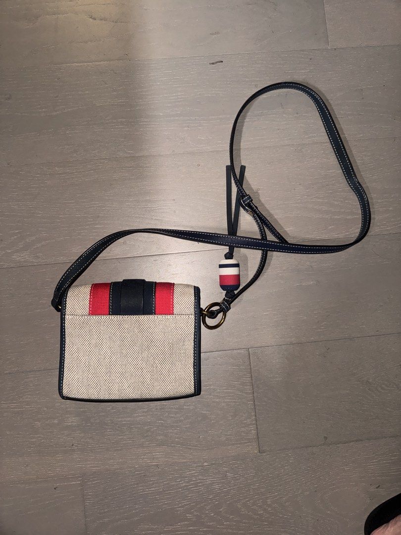 tory burch maritime stripe crossbody bag (Category: Cross-body Bags) located in Makati City. Submitted by jekjekdecls (Listing ID 1468777219, Image 2). Description: havent used this bag in years since it was given to me, i also dont like micro sized bags. priced at ebay for 11-12k, selling for a third of the price. pls help me declutter! will need to clean. pls refer to pics for the bag condition. tory burch card isnt there anymore idk why (discl