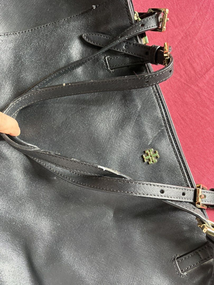 Tory Burch York Buckle Tote Black Leather (Category: Shoulder Bags) located in Makati City. Submitted by rizadc30 (Listing ID 1468776906, Image 3). Description: - Brand: Tory Burch Original - Material: Durable Saffiano leather in classic black - Hardware: Gold-tone hardware (still gold) - Straps: Adjustable twin shoulder straps - Interior: Logo-lined fabric with zip pockets and slip compartments - Condition: Minor surface wear on leather and stra