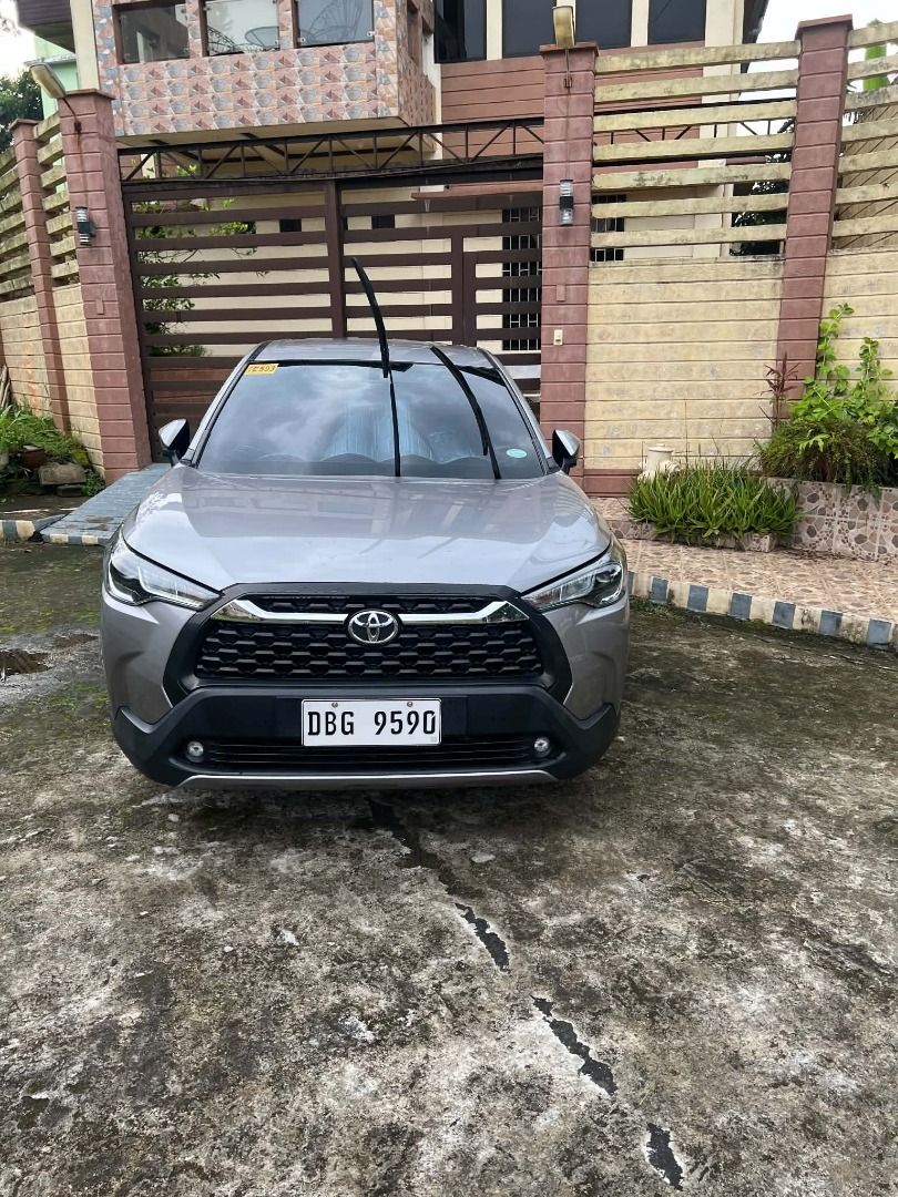 Toyota Corolla Cross G Auto (Category: Used Cars) located in Tagaytay City. Submitted by evgor53 (Listing ID 1468922662, Image 1). Description: MARK DOWN!!!!! RUSH SALE!!!! Color: Metal stream. Leather seat (Toyota logo)., Deep dish, Mags 17" (stock). Toyota built in front and rear camera recorder. Rear view camera. Window visor. Toyota infotainment. Nothing replaced - all stock components..