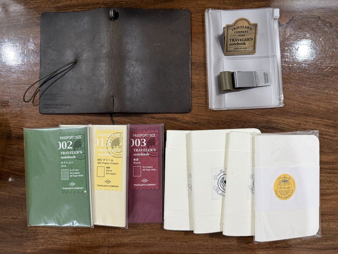 Traveler’s Notebook Set (Category: Other Stationery & Craft) located in Manila. Submitted by tater_thoughts (Listing ID 1468777379, Image 1). Description: Sold as set TN Olive Passport Size Olive Pen Holder 004 Zipper Pocket 013 TN Paper Cream Refill 003 TN Blank Refill 002 TN Grid Refill (4) Bluetraces Ph Blank Refill 030 Brass Clip TRC Logo MOP: BDO or BPI RFS: downsizing MOD: same-day delivery or JnT Express.