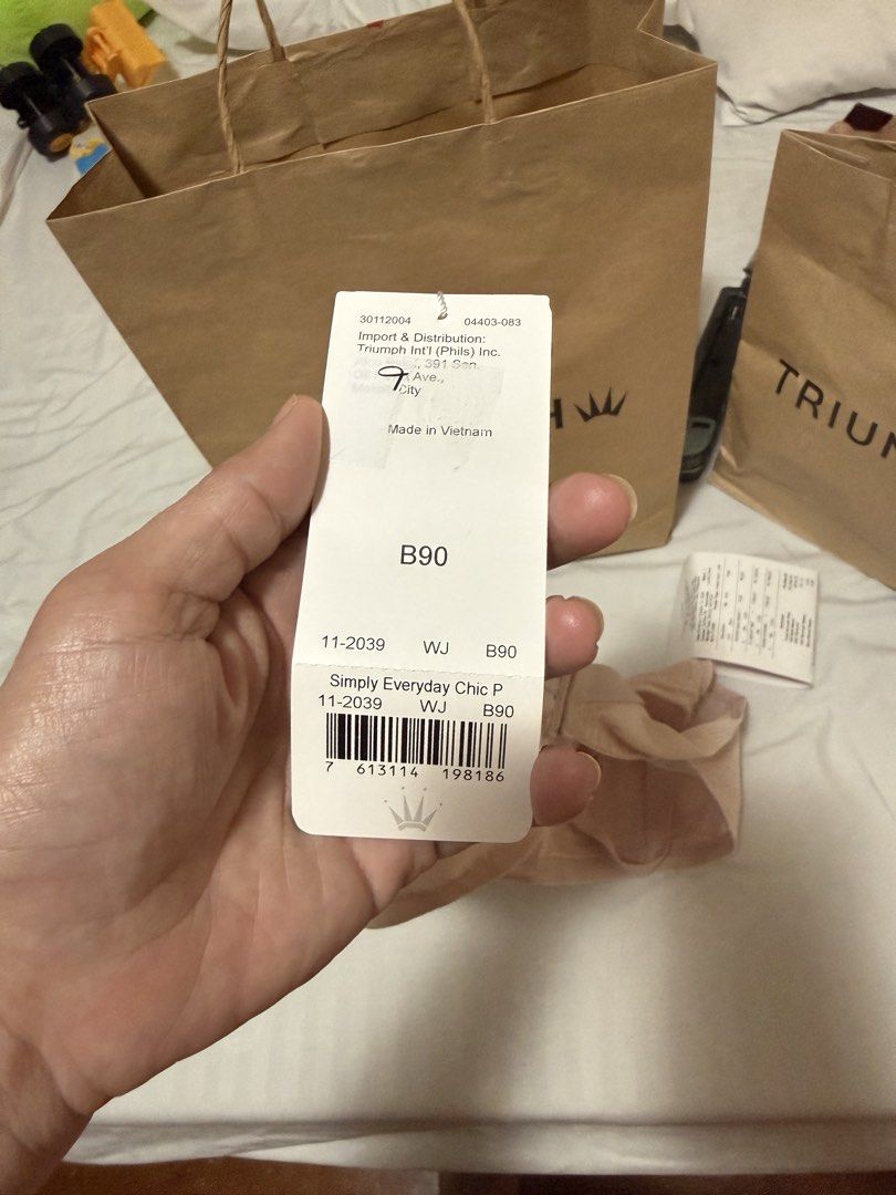 Triumph Simply Everyday Chic P Bra B90 (Category: Undergarments & Loungewear) located in Cebu City. Submitted by jocapin32 (Listing ID 1468733182, Image 3). Description: - Brand: Triumph (Simply Everyday Chic P) - Size: B90/CupB40 - Color: Pink - Condition: Brand new, never worn with original store tag attached - Features: Zigzag pattern texture, underwire support, and adjustable straps - Inclusions: Original store tag -d kasya kay mama.