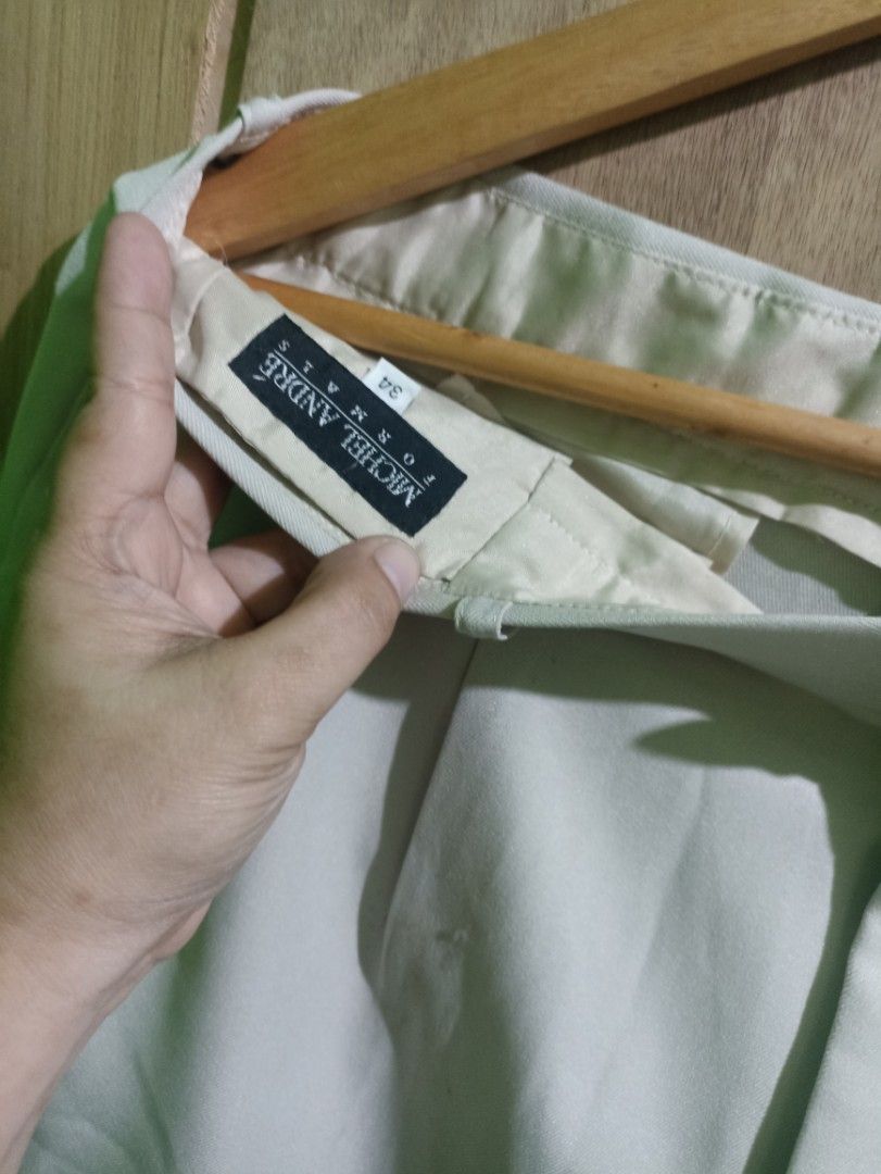 Trouser Michel Andre Off-White Pleated Trousers Size 34 (Category: Trousers) located in Tarlac. Submitted by allinoneshop2178 (Listing ID 1468738607, Image 2). Description: - Brand: Michel Andre - Color: Off-white / Neutral - Size: 34 -length:42inch - Fit: Straight wide-leg cut with double pleats on the front - Pockets: Two welt pockets on the back - Details: Clean finish along the waistband and cuffs - Versatility: Easy to style with any button-
