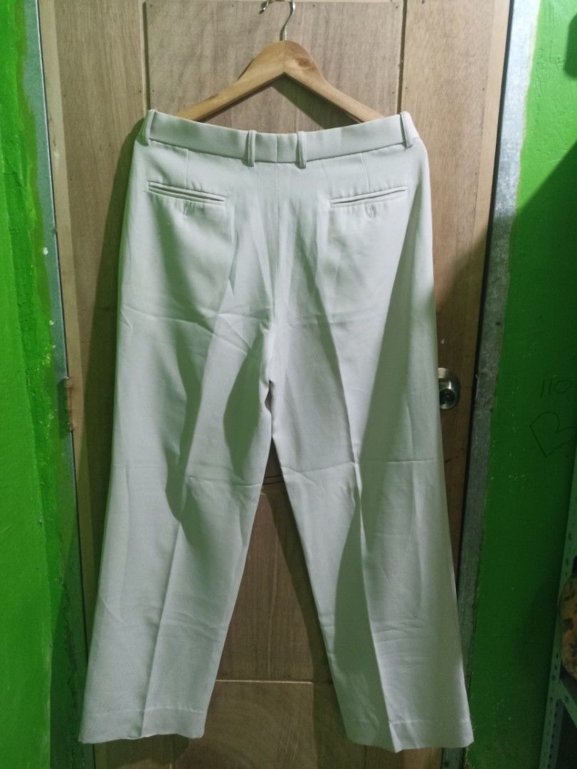 Trouser Michel Andre Off-White Pleated Trousers Size 34 (Category: Trousers) located in Tarlac. Submitted by allinoneshop2178 (Listing ID 1468738607, Image 3). Description: - Brand: Michel Andre - Color: Off-white / Neutral - Size: 34 -length:42inch - Fit: Straight wide-leg cut with double pleats on the front - Pockets: Two welt pockets on the back - Details: Clean finish along the waistband and cuffs - Versatility: Easy to style with any button-