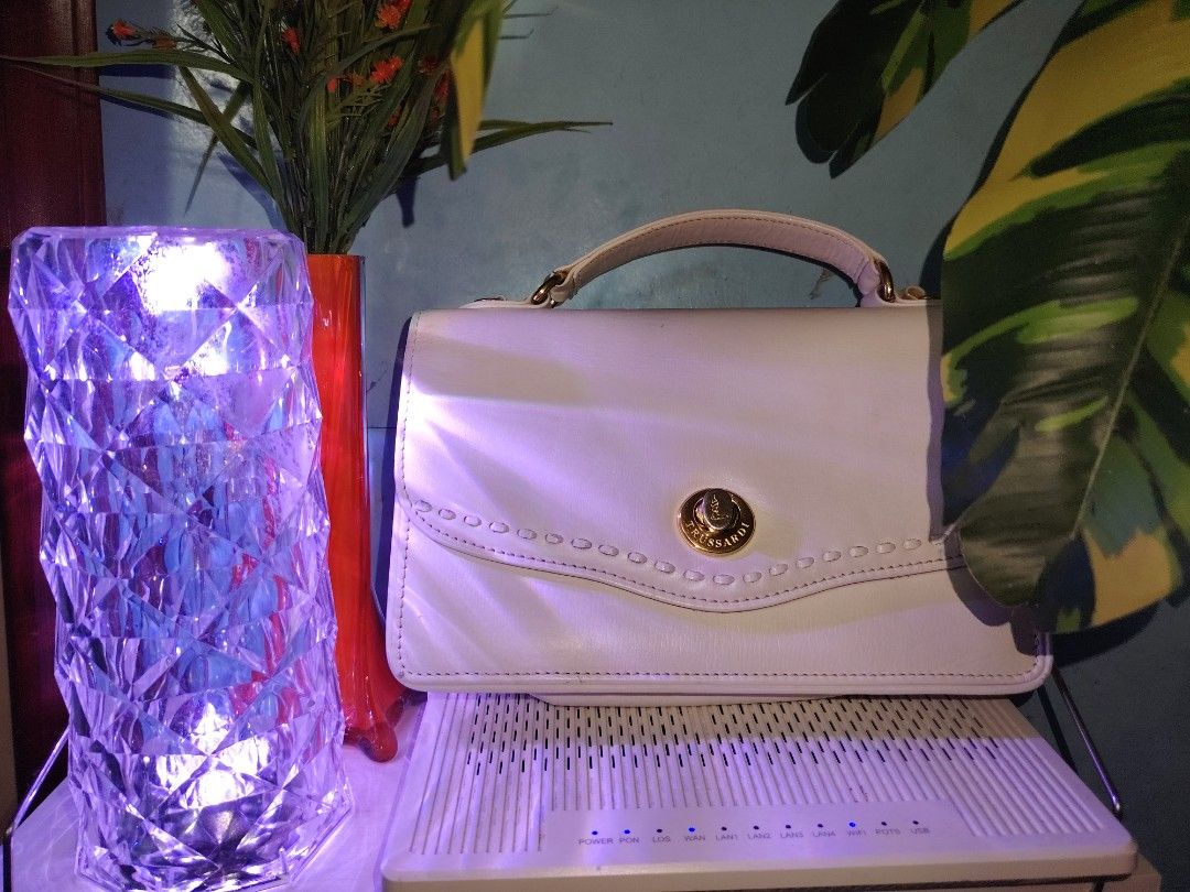 Trussardi Turn-Lock Handbag (Category: Luxury Bags & Wallets) located in Bacoor. Submitted by sally_cars1 (Listing ID 1468806991, Image 1). Description: This is a Authentic Trussardi Turn-Lock Handbag from Japan! No faults, just the interior that have few stains from Japan, otherwise from that, its pretty much it! Of course discount is offered! Just for my lovely customers! The decision's yours, babe!.