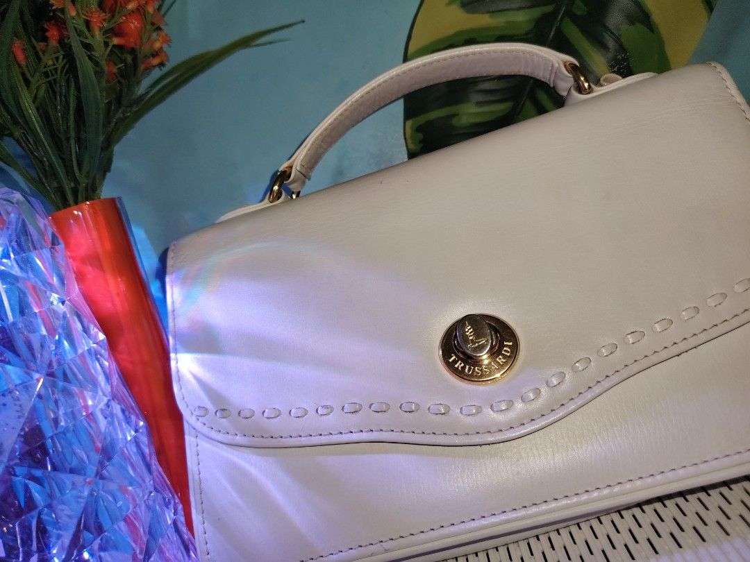Trussardi Turn-Lock Handbag (Category: Luxury Bags & Wallets) located in Bacoor. Submitted by sally_cars1 (Listing ID 1468806991, Image 2). Description: This is a Authentic Trussardi Turn-Lock Handbag from Japan! No faults, just the interior that have few stains from Japan, otherwise from that, its pretty much it! Of course discount is offered! Just for my lovely customers! The decision's yours, babe!.