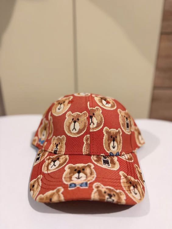TTWN Bear Orange Teddy Bear Print Baseball Cap (Category: Vintage Collectibles) located in Cebu City. Submitted by ubecstoned (Listing ID 1468819215, Image 1). Description: - Brand: TTWN Bear - Color: Vibrant orange with all-over woven teddy bear pattern (includes bears in blue bowties) - Material: 100% cotton with black inner lining and branded tag - Fit: Adjustable metal strap closure at the back.