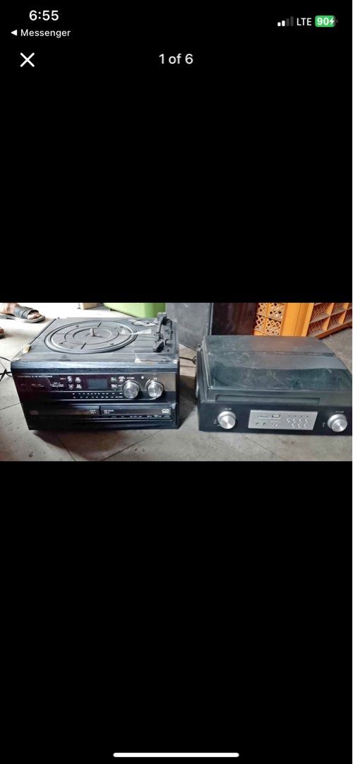 Turntable and CD Recorder Audio System (Category: Portable Music Players) located in Caloocan City. Submitted by BrixGarcia (Listing ID 1468791469, Image 2). Description: - 2-in-1 audio units: Turntable and CD recorder with built-in radio tuners - Classic design: Features front panel dials, volume knobs, and playback/recording buttons - Unit 1 details: Includes an open CD tray below the receiver - Unit 2 details: Comes with a protective dust cove