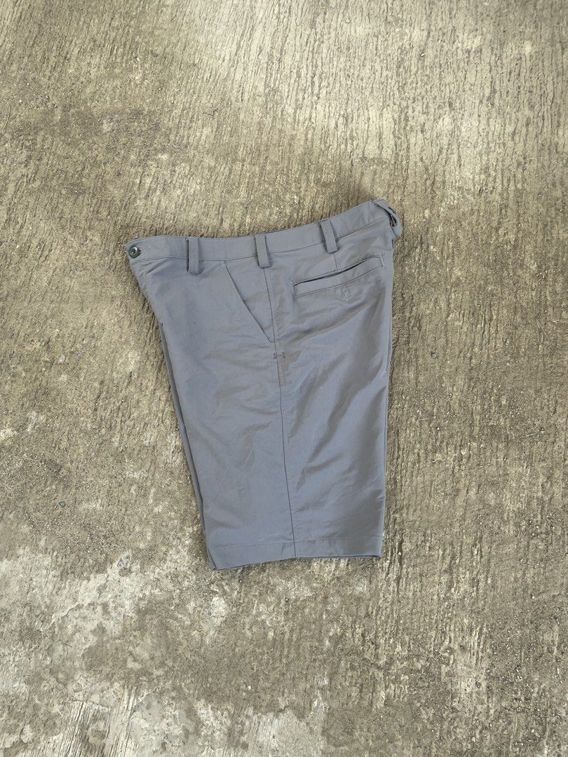 Under Armour Grey Golf Shorts Size 34 (Category: Shorts) located in Manila. Submitted by lawlaw21 (Listing ID 1468801588, Image 1). Description: - Brand: Under Armour - Size: 34 waist - Color: Grey - Material: Lightweight and breathable, ideal for golf or hot weather - Pockets: Two front pockets and two back welt pockets with button closure - Features: Stretch waistband with logo tag detail on back loop - Condition: Clean, hardly worn.