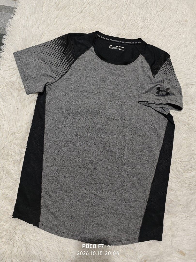 Under Armour HeatGear Grey Black (Category: Activewear) located in Batangas. Submitted by krtbzr (Listing ID 1468928785, Image 1). Description: UA Heatgear Mesh Active wear Excellent Condition Best Fit to Large Width 21" x Length 29" 2XL on tag Stretch Compression Tee.